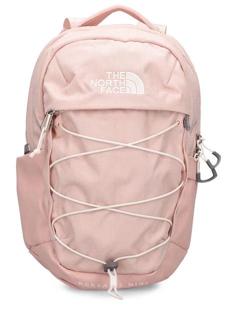 baby pink north face backpack.